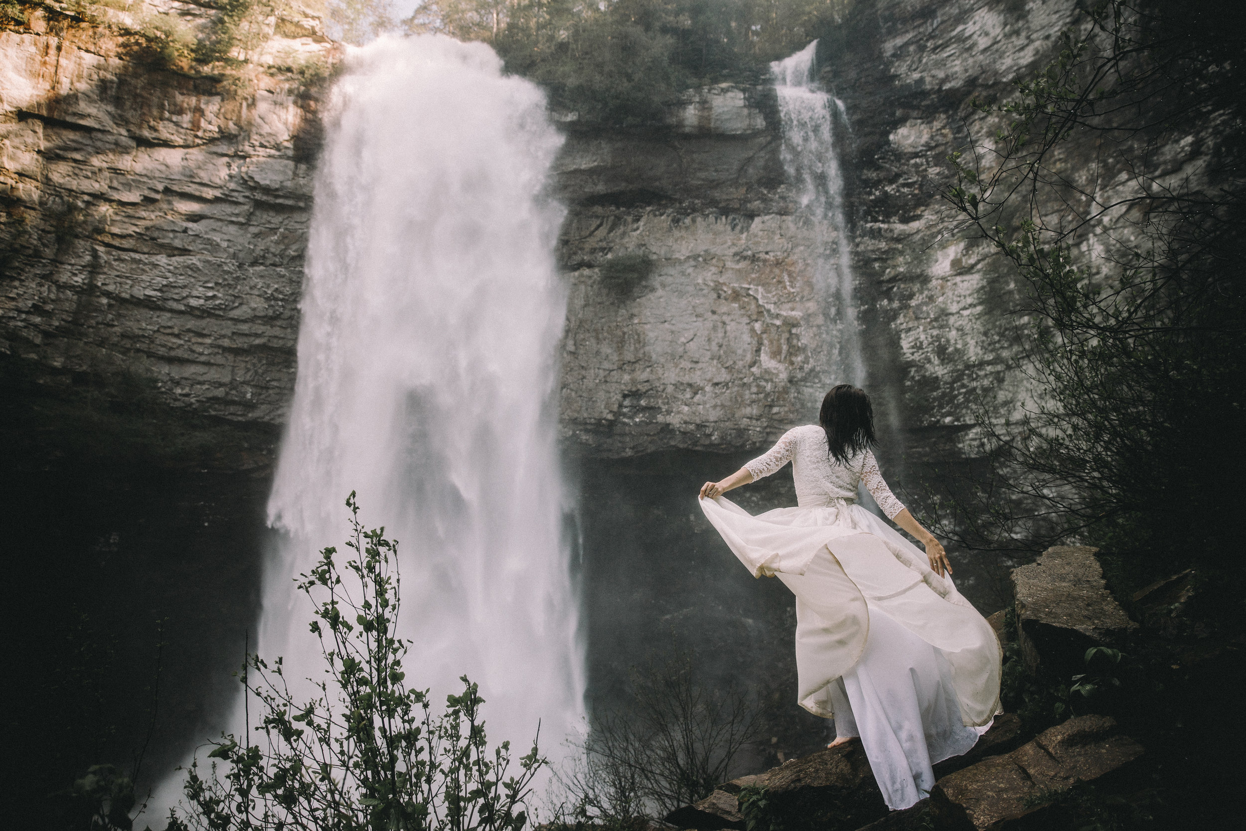 bride at waterfall