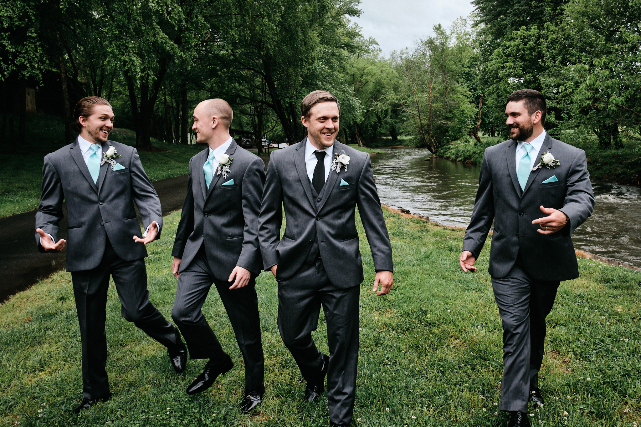Groomsmen on river