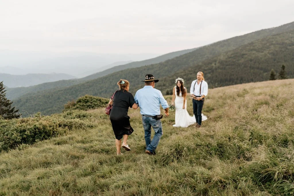 parents witnessing elopement ceremony with emotional smiles..jpg