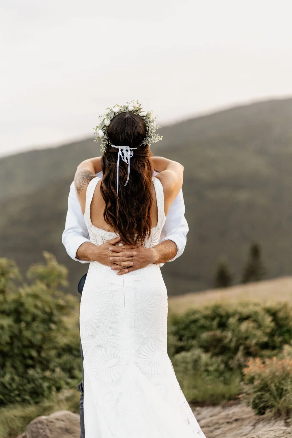 Mountain breeze catching bride’s veil mid-ceremony..jpg