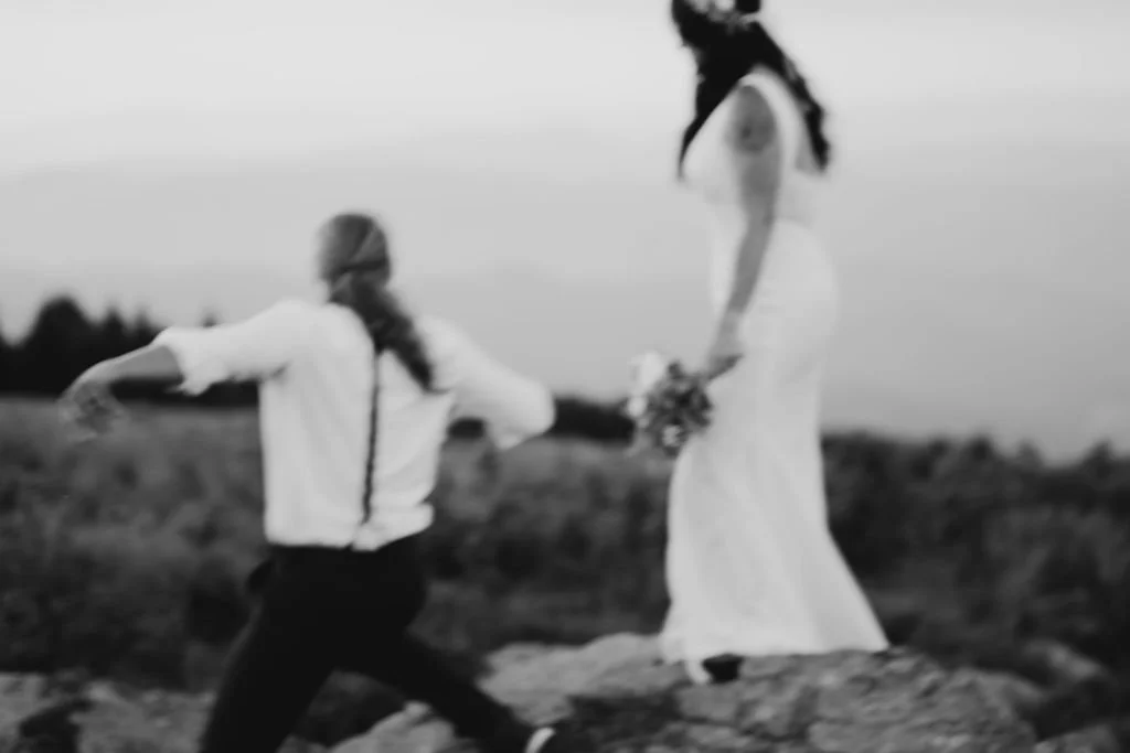 Sweeping mountain vista under dramatic skies—perfect for elopement vow.jpg