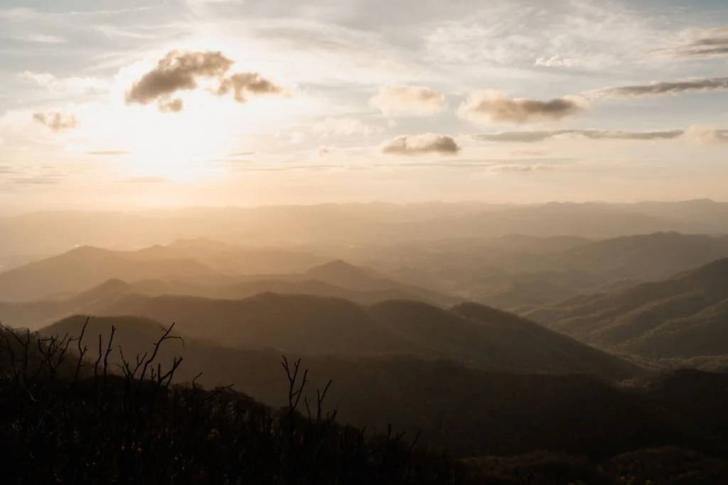 Panoramic view of layered Blue Ridge mountain ridges at golden hour, scenic elopement location in the Appalachian mountains Georgia.jpg