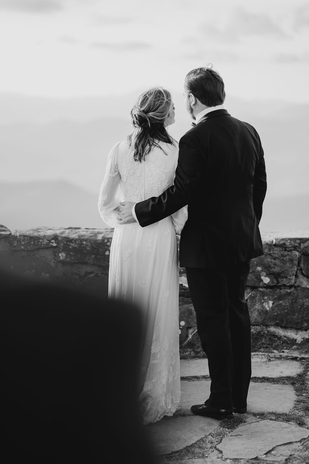 Victoria and Quinn sharing an intimate couple portrait at sunrise on Wayah Bald, Appalachian Trail, Nantahala National Forest NC, Blue Ridge GA intimate wedding photographer