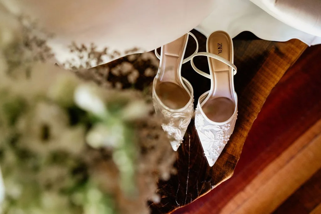 Close-up of bride Cayli's wedding sandals, intimate detail photo from her Blue Ridge Georgia cabin mountain wedding, Appalachian Wedding Photography