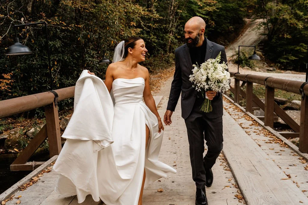 Jason and Cayli sharing a candid moment during their intimate Blue Ridge Georgia cabin wedding day, photographed by Appalachian Wedding Photography