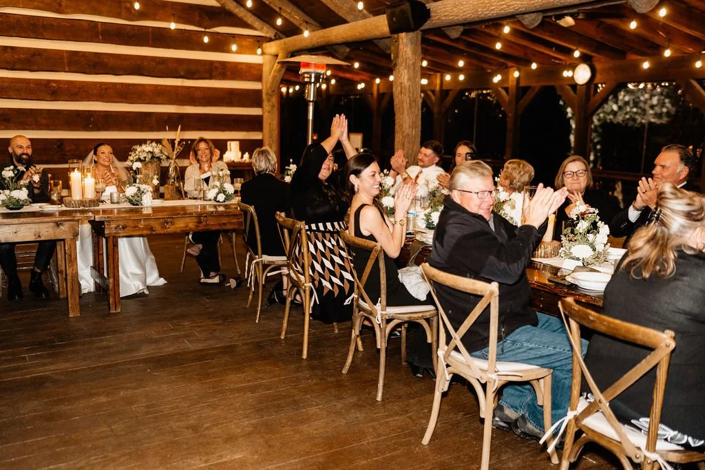 Wedding reception table details inside a Blue Ridge Georgia mountain cabin, intimate cabin wedding florals and candlelight by Appalachian Wedding Photography