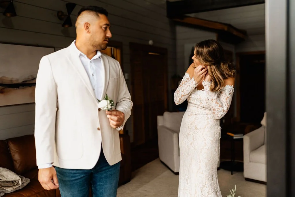 William turning to see Erin for the first time during their first look inside the cabin, Erin visibly emotional with her hand at her face, during their Blue Ridge Georgia elopement