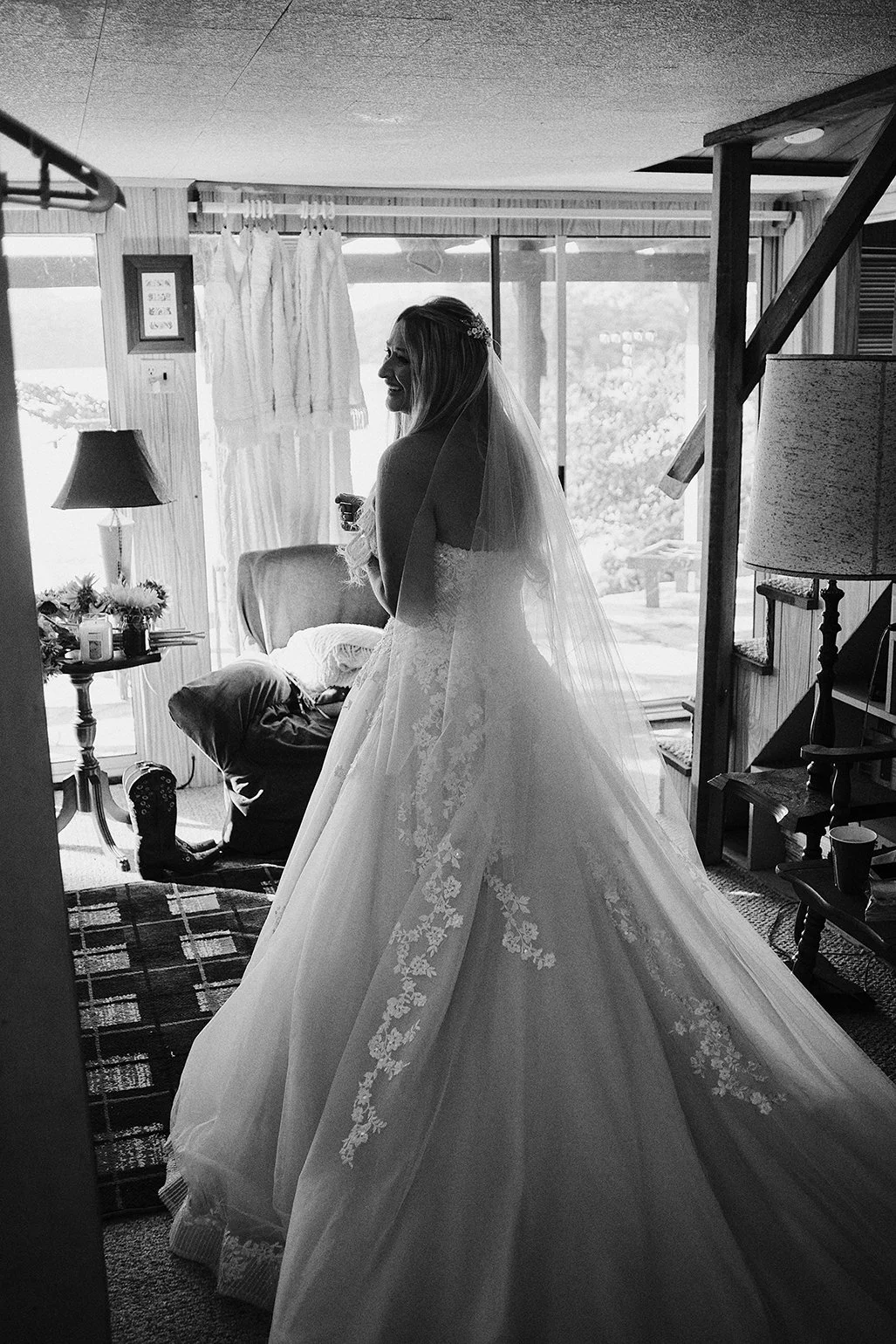 Bride getting ready in a cozy mountain cabin during her Blue Ridge, Georgia wedding day