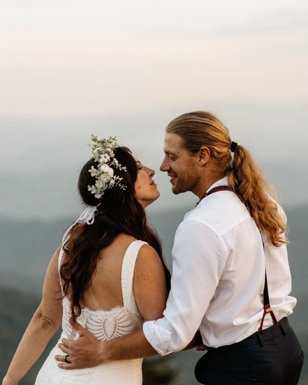 Mountain breeze catching bride veil mid ceremony Roan Mountain elopement Tennessee