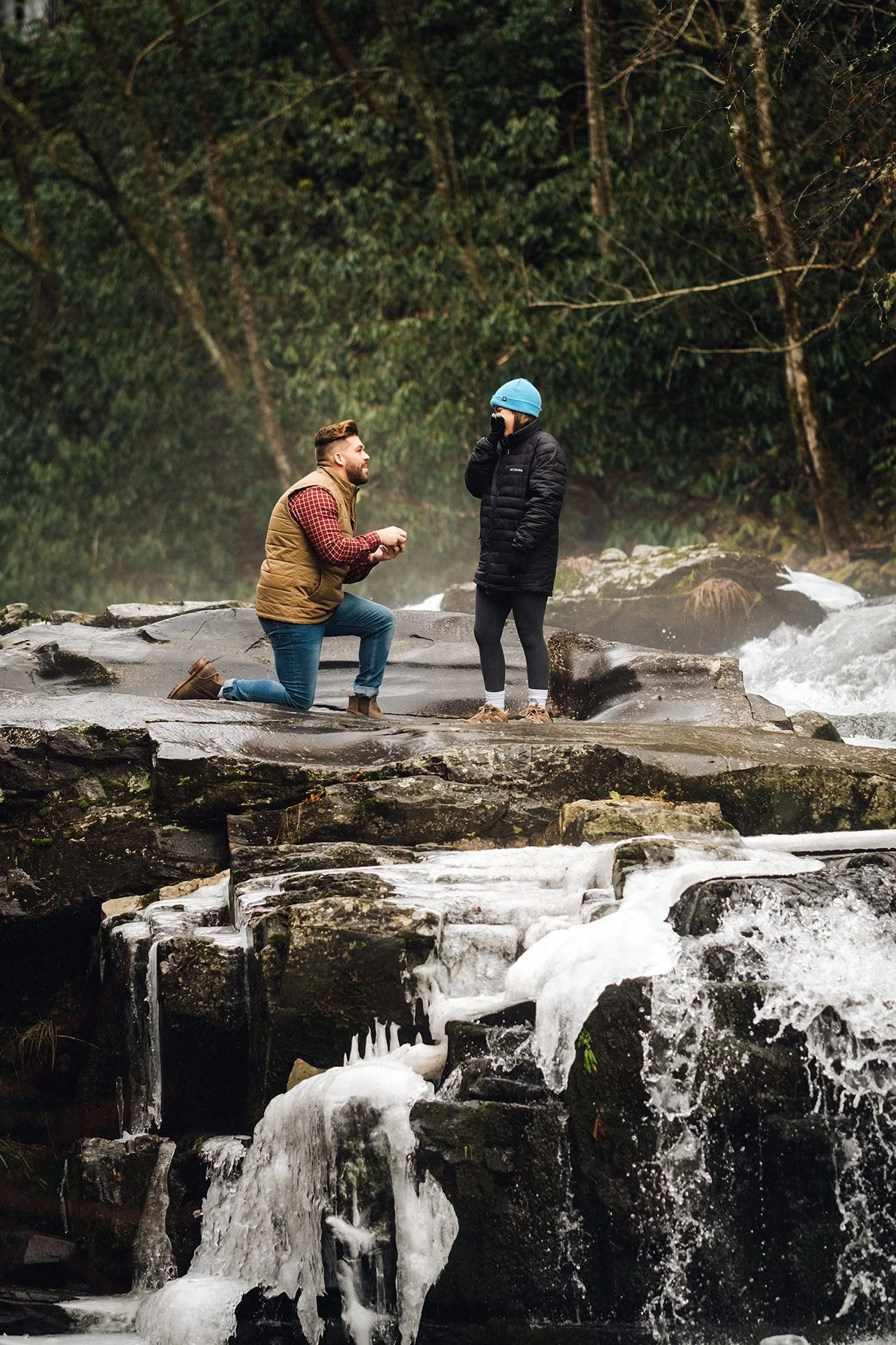 Romantic waterfall proposal in the Appalachian mountains captured by Blue Ridge engagement photographer