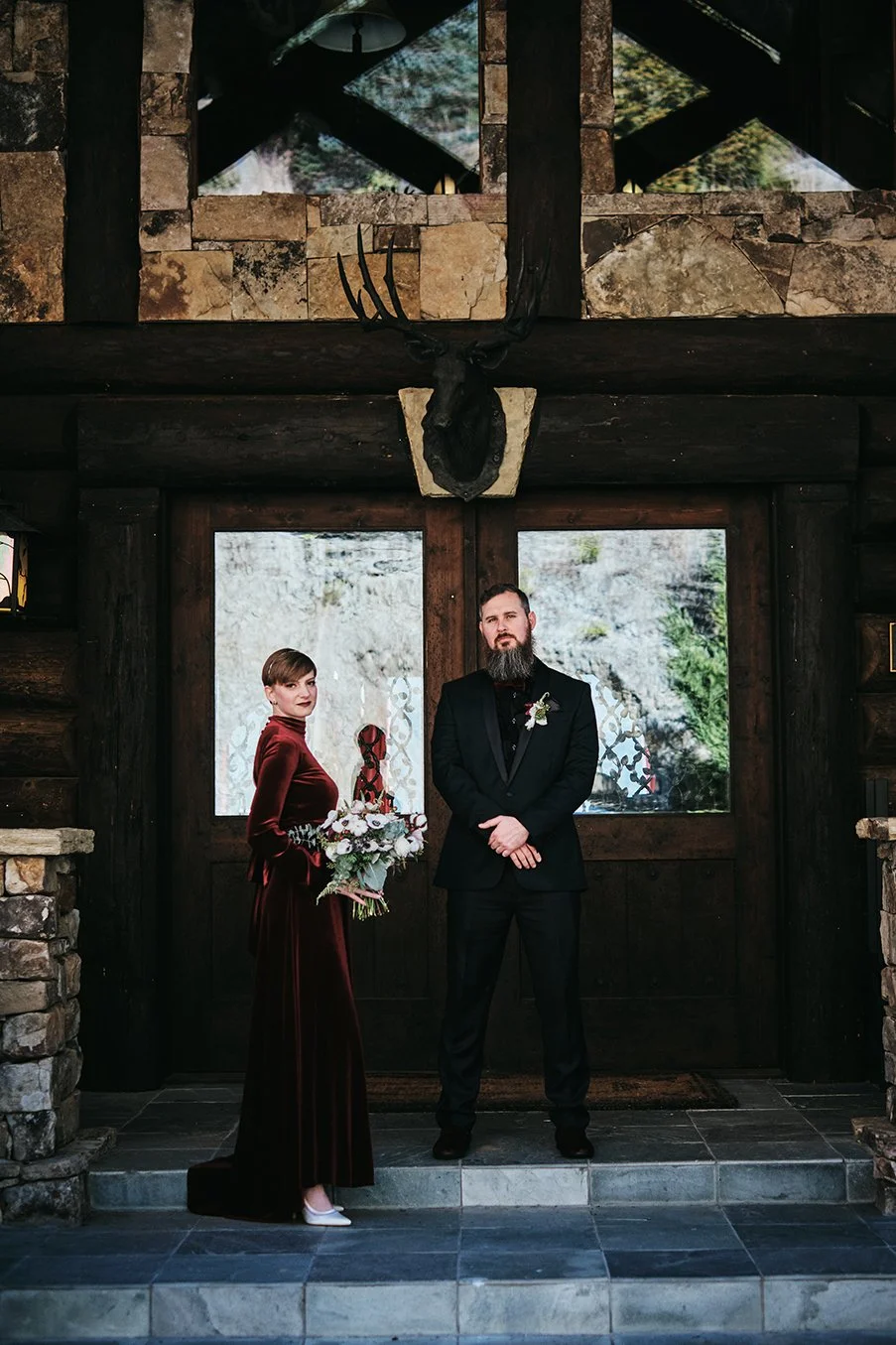 Couple portrait at a rustic mountain lodge during their intimate Blue Ridge wedding