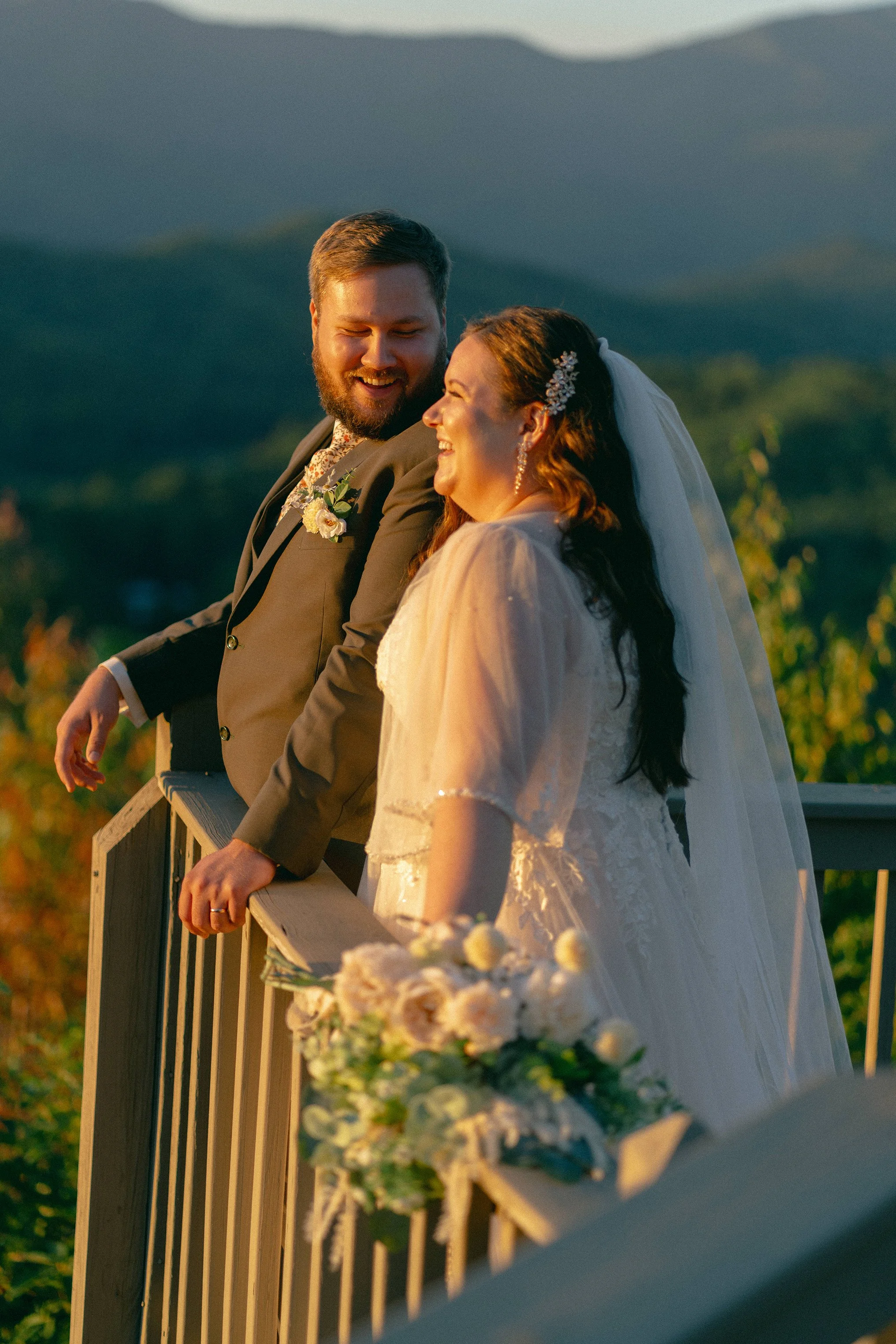Couple at golden hour on a mountain overlook during their Blue Ridge, Georgia wedding