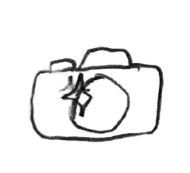 A black and white line drawing of a camera with a small unicorn figure inside the lens area.