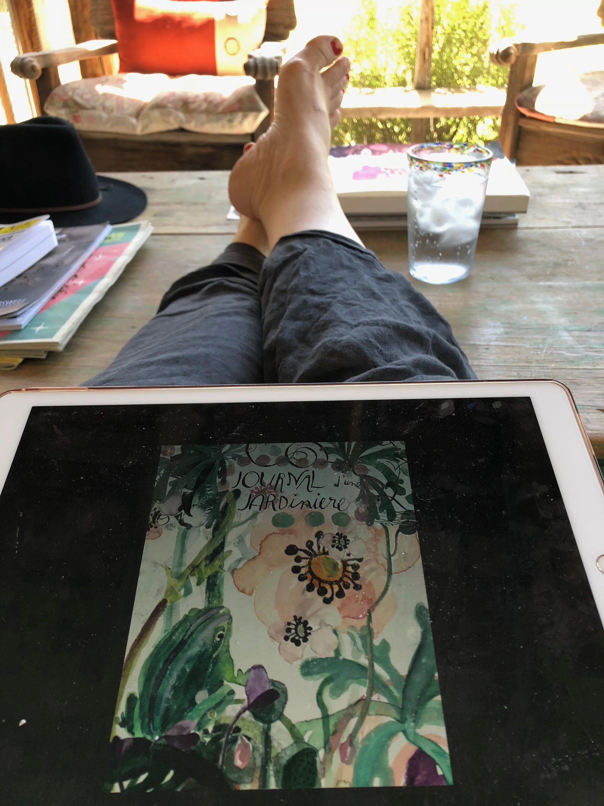 THE LIFE. Don't mind my chipped nail polish and adorable chubby Hobbit toes--concentrate on how illustrators get to do it!