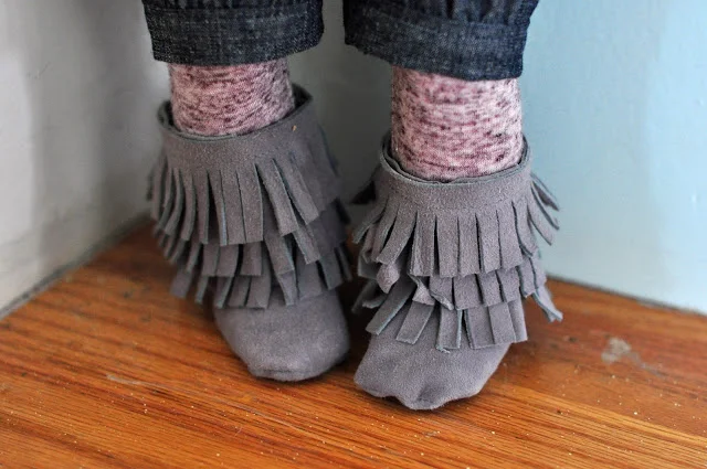 I made these boots for Natalie's doll from a scrap of genuine leather! Be sure and buy a leather needle for your machine if you attempt this.