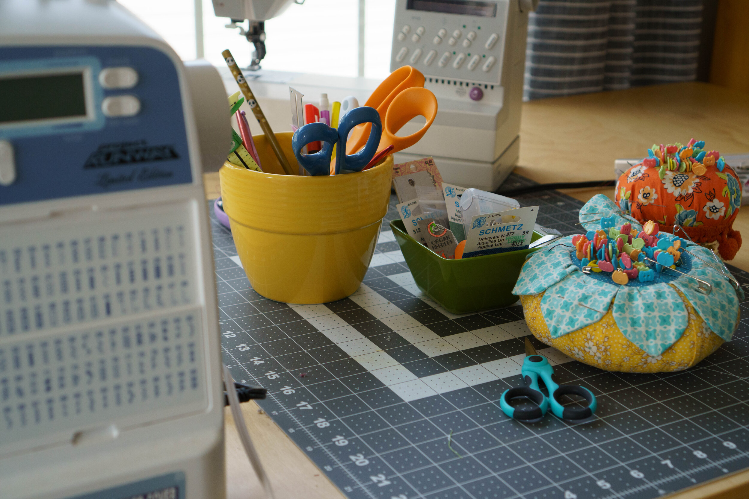 All my best tips for sewing and craft room organization! Learn how to keep your space clean, organized and clutter free, with good systems and good habits. || Pin Cut Sew Studio #sewingroom #craftroom #organization