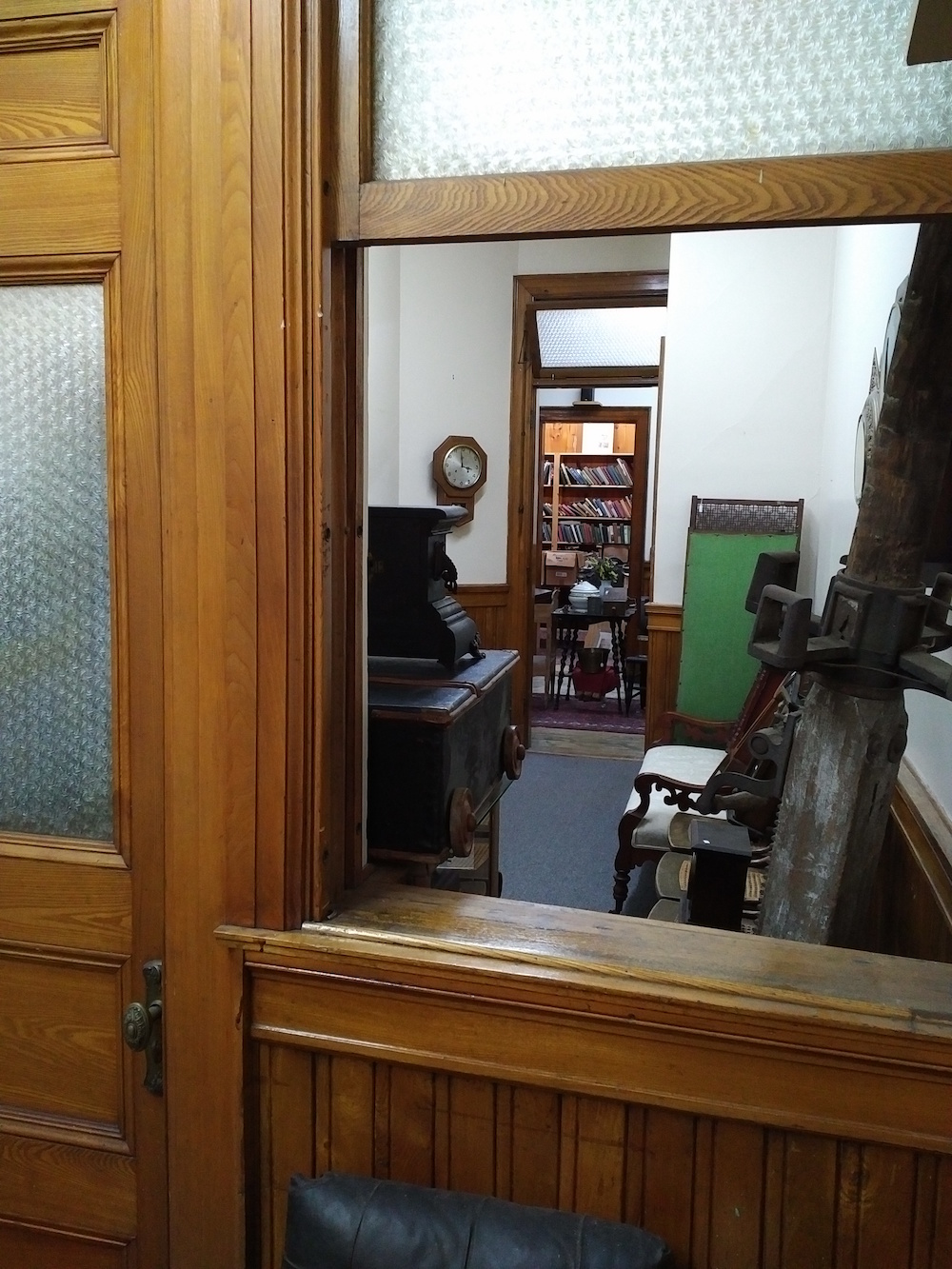 Peeking through the window into the next room of vintage treasures. . .