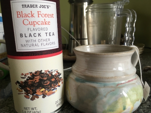 Currently drinking: Black forest cupcake tea in a fairy colored mug. Reminds me of Sophia's hair from Awaken , referenced below.