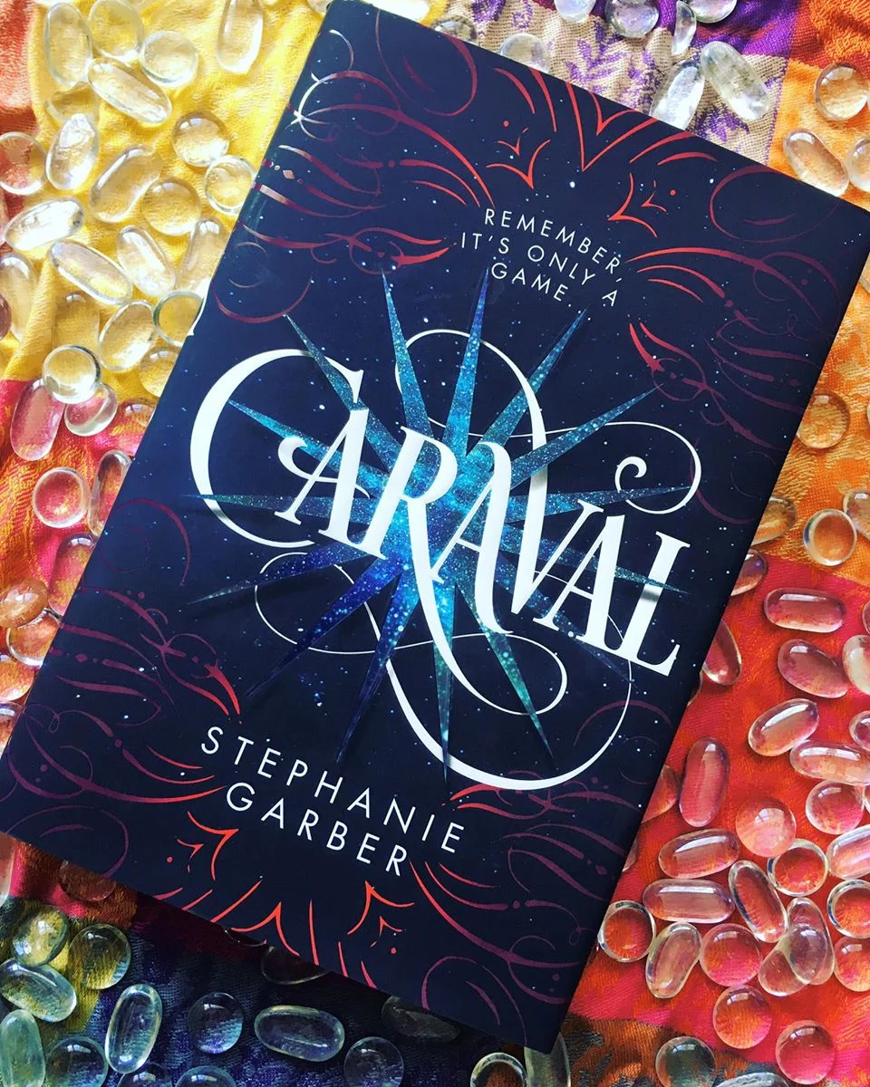 That cover is gorgeous, no? The picture really doesn't do it justice. It's so shiny and sparkly! I'm glad I've got the book now because I understand it's already becoming a movie and I hate movie covers.