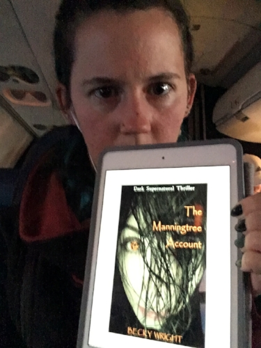 I'm sorry I look so cross in this picture. It has nothing to do with the book and everything to do with the fact that I was thousands of feet up in the air. I am not what you would call a happy flyer.