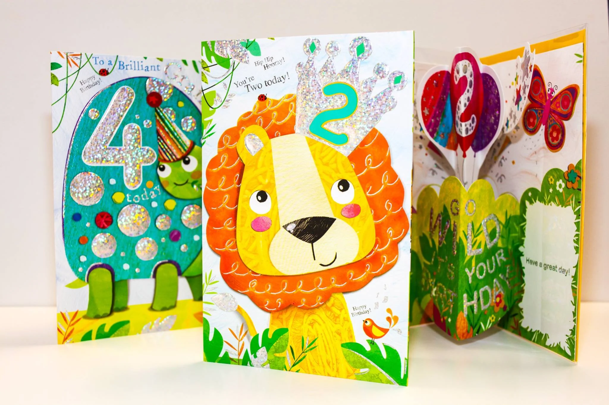 A range of collaged children's pop up greeting cards for The Art Group . These Jojo's Jungle designs are finished with a sparkly holographic foil. 