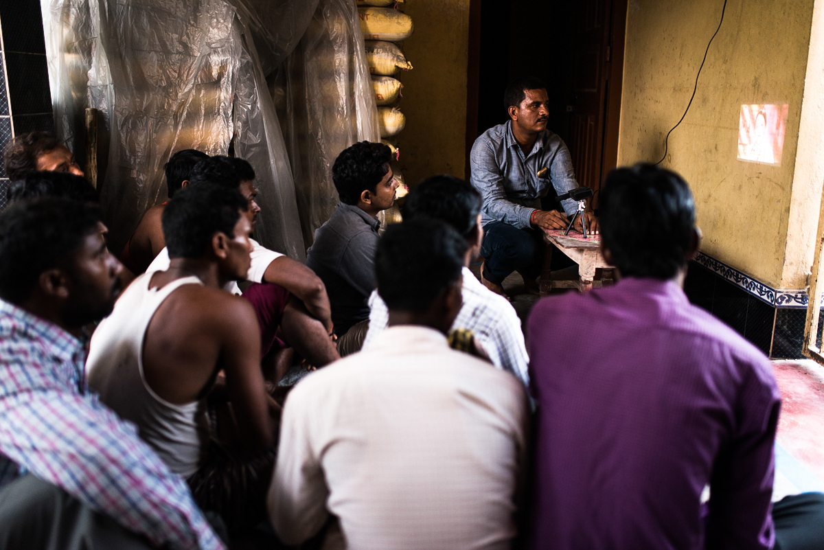  October, 2016. Patori Block, Samastipur district, Bihar, India.&nbsp;  Pankaj, Village Health Champion of ABT Associates plays an educational video on family planning for men's group meeting in the village. He meets men individually to discuss about