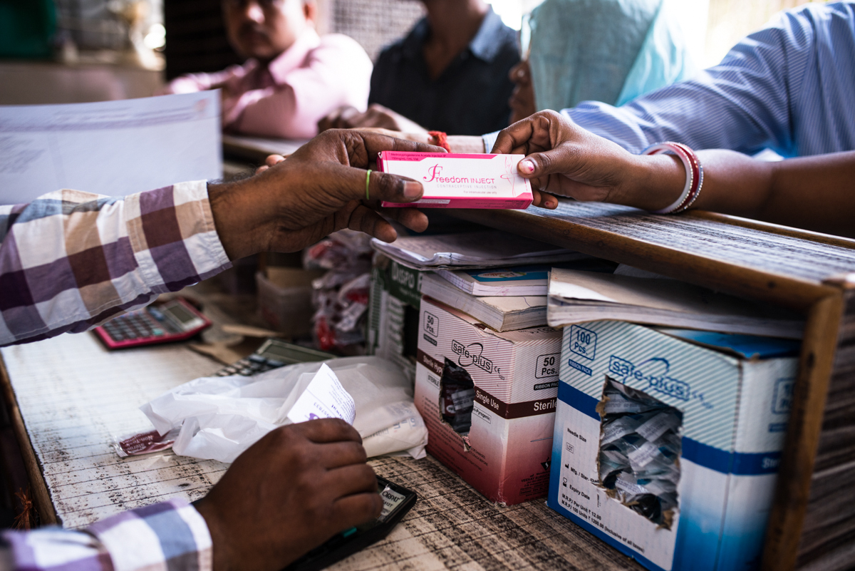  October, 2016.&nbsp;Agra, Uttar Pradesh, India.  A pharmacy store owner selling a DMPA kit. 