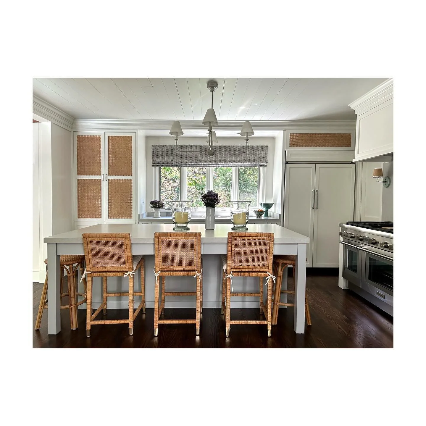 This kitchen renovation was guided by the &ldquo;less is more&rdquo; philosophy. With a focus on restraint, we streamlined storage, simplified the material palette, and created a clean, modern look. Opening the kitchen to the living room adds seamles