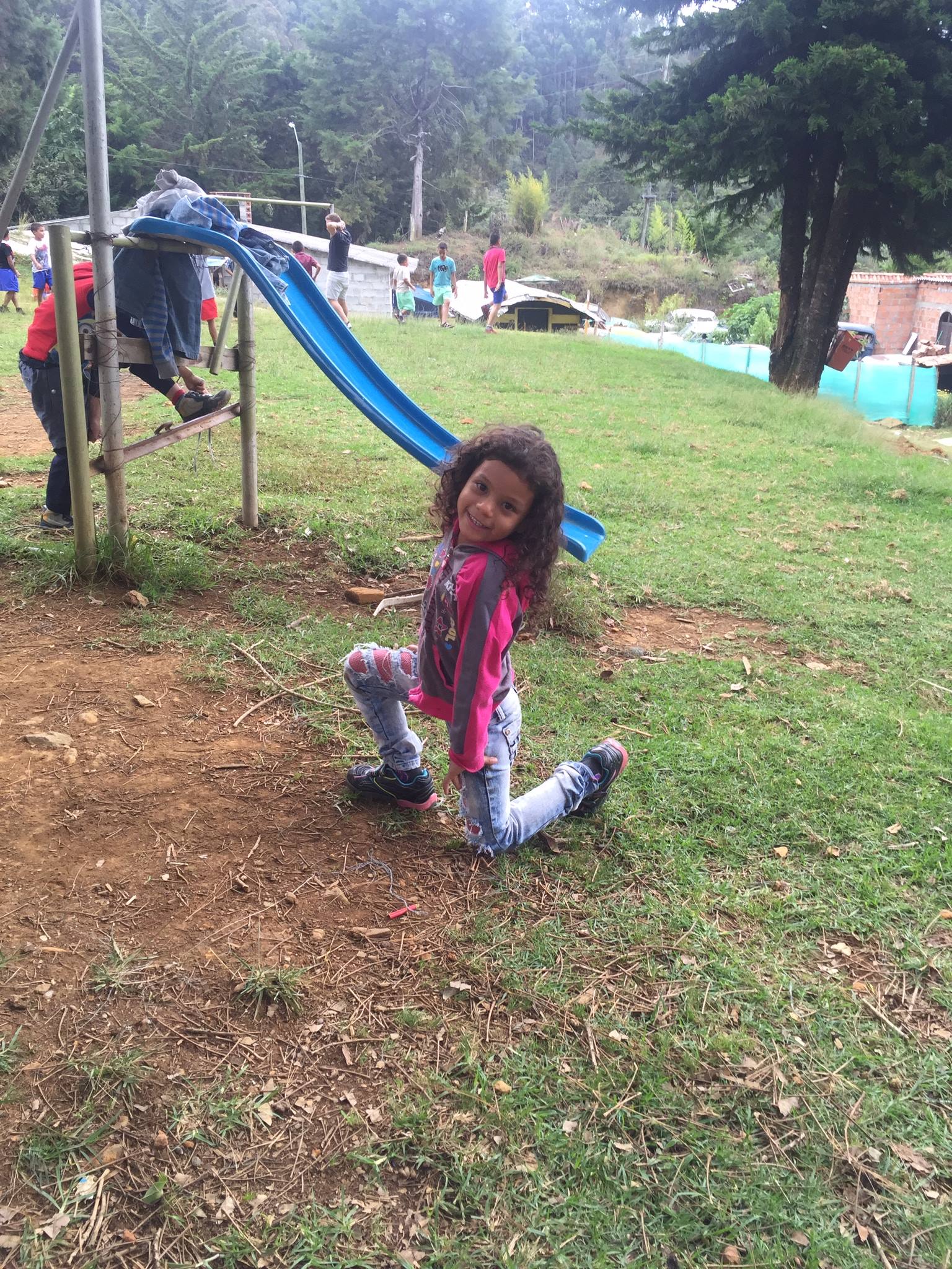 Girl at the orphanage playing in her new shoes 