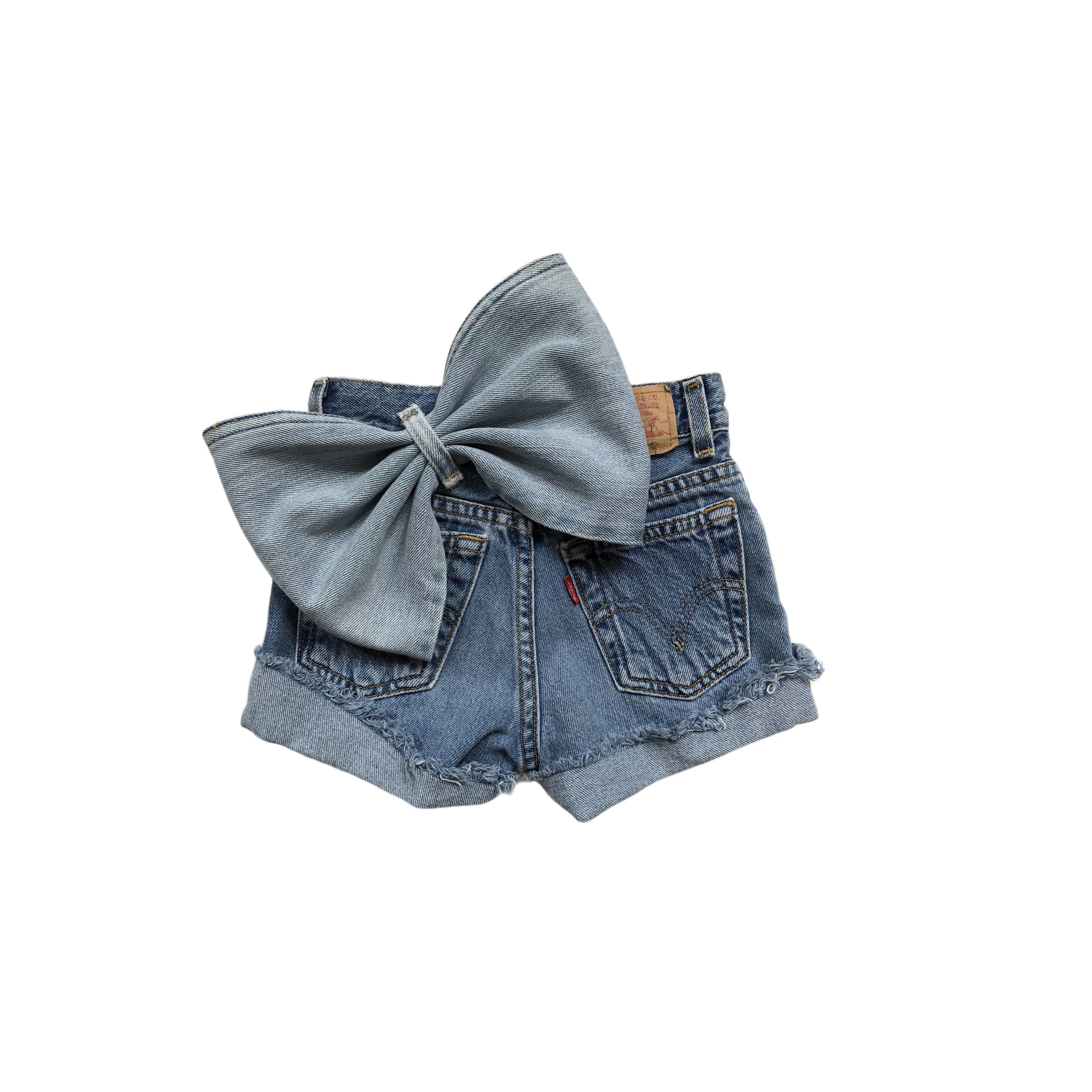 MATERIAL GIRL:  vintage denim cut-offs with oversized bow