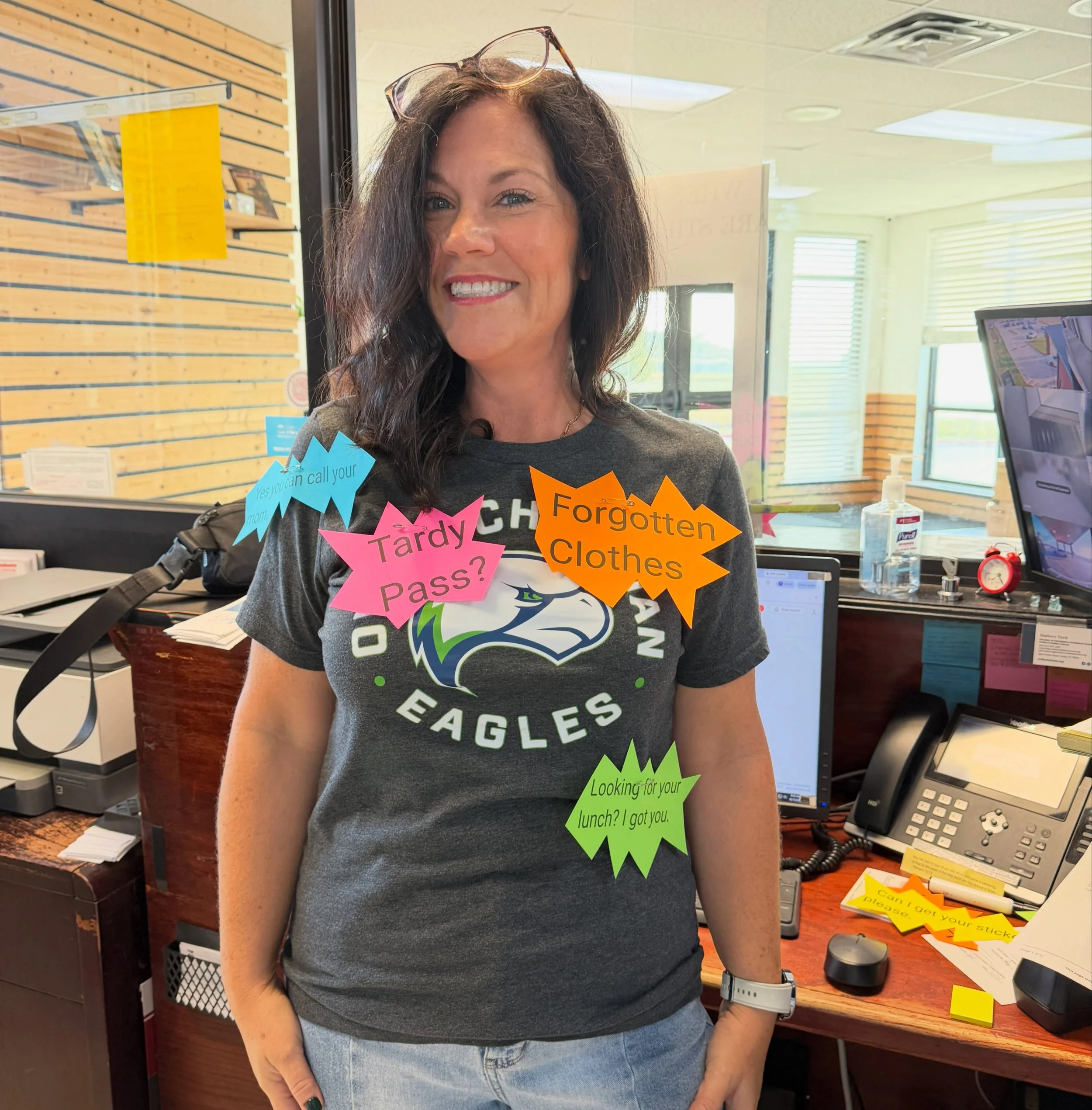 Front desk vibes captured by our incredible receptionist, Page! She&rsquo;s rocking Meme Day for HOCO with all the things you could put above her picture for a meme. 

#frontdesk 
#receptionist 
#hoco2026