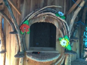 Sculptural stained glass flowers decorating the Enchanted Fairy House.