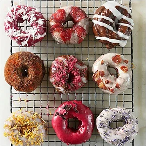Circa doughnuts reimagines the doughnut for gluten free fans. With flavors redolent of hibiscus and berry or maple and bacon, these doughy treats are just like the originals. Read the article.