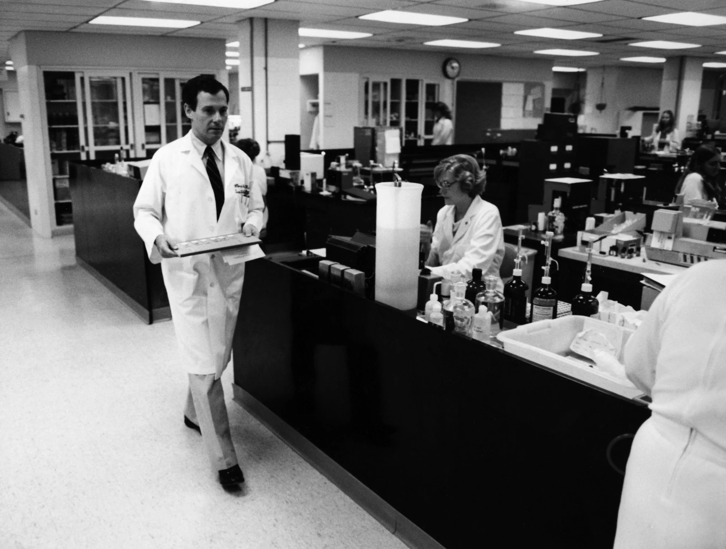 Dr. Milton Finegold in the pathology lab in the 1980s.