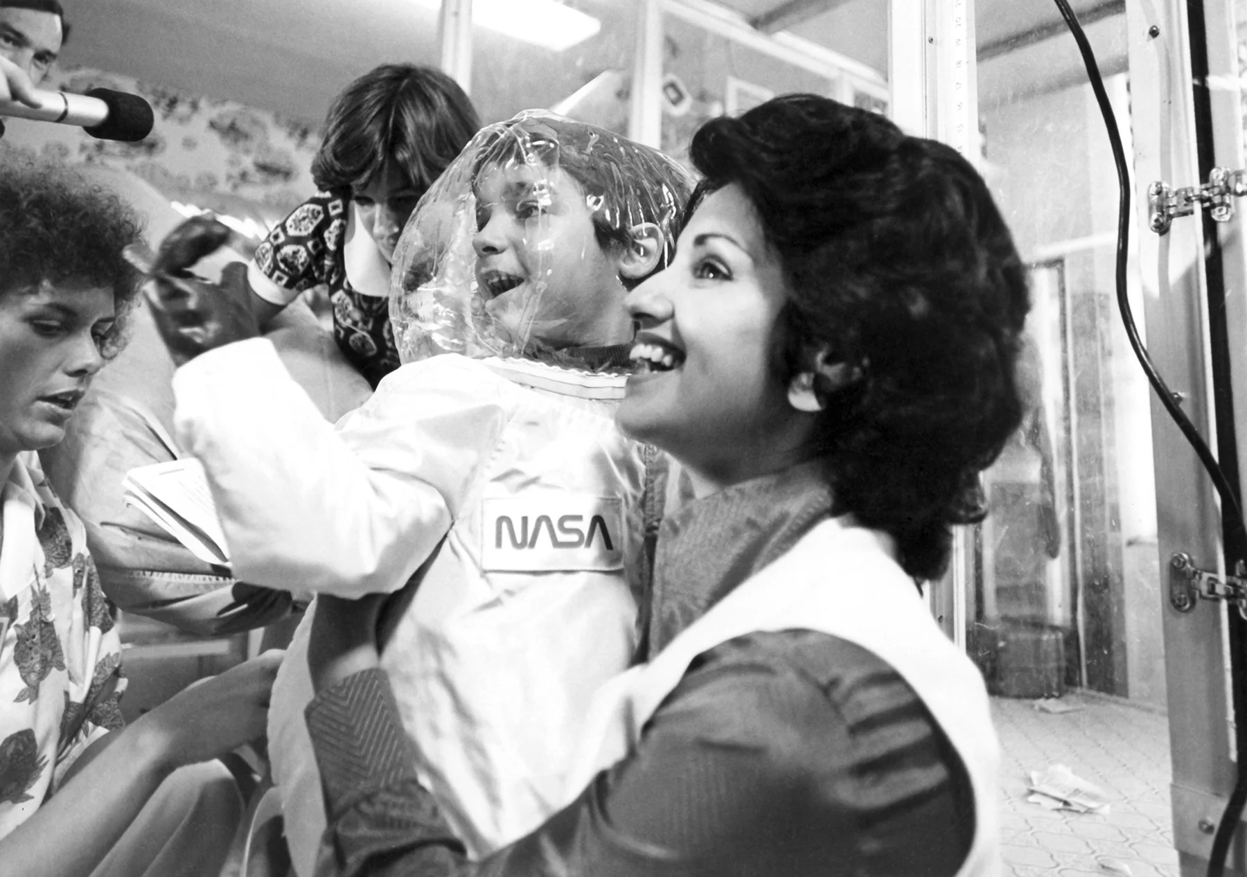 Carol Ann Demaret holds her son, 6-year-old Texas Children’s patient, David Vetter, prior to his first walk in a spacesuit in 1977. Vetter had Severe Combined Immunodeficiency, which required him to live in a plastic bubble to protect him from harmful bacteria.