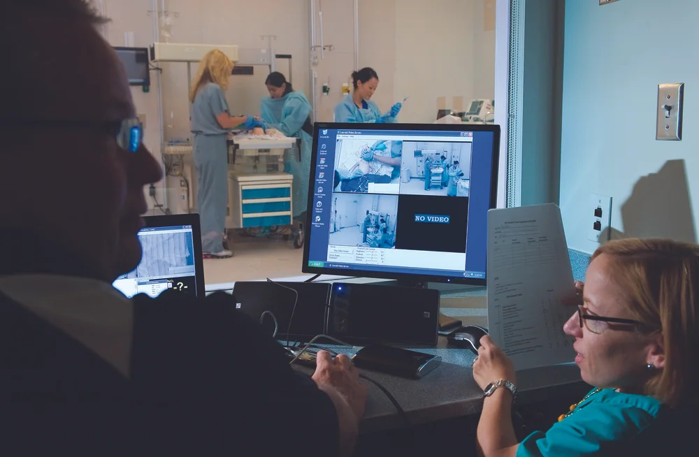 Dr. Jennifer Arnold conducting a Simulation Center labor and delivery exercise.