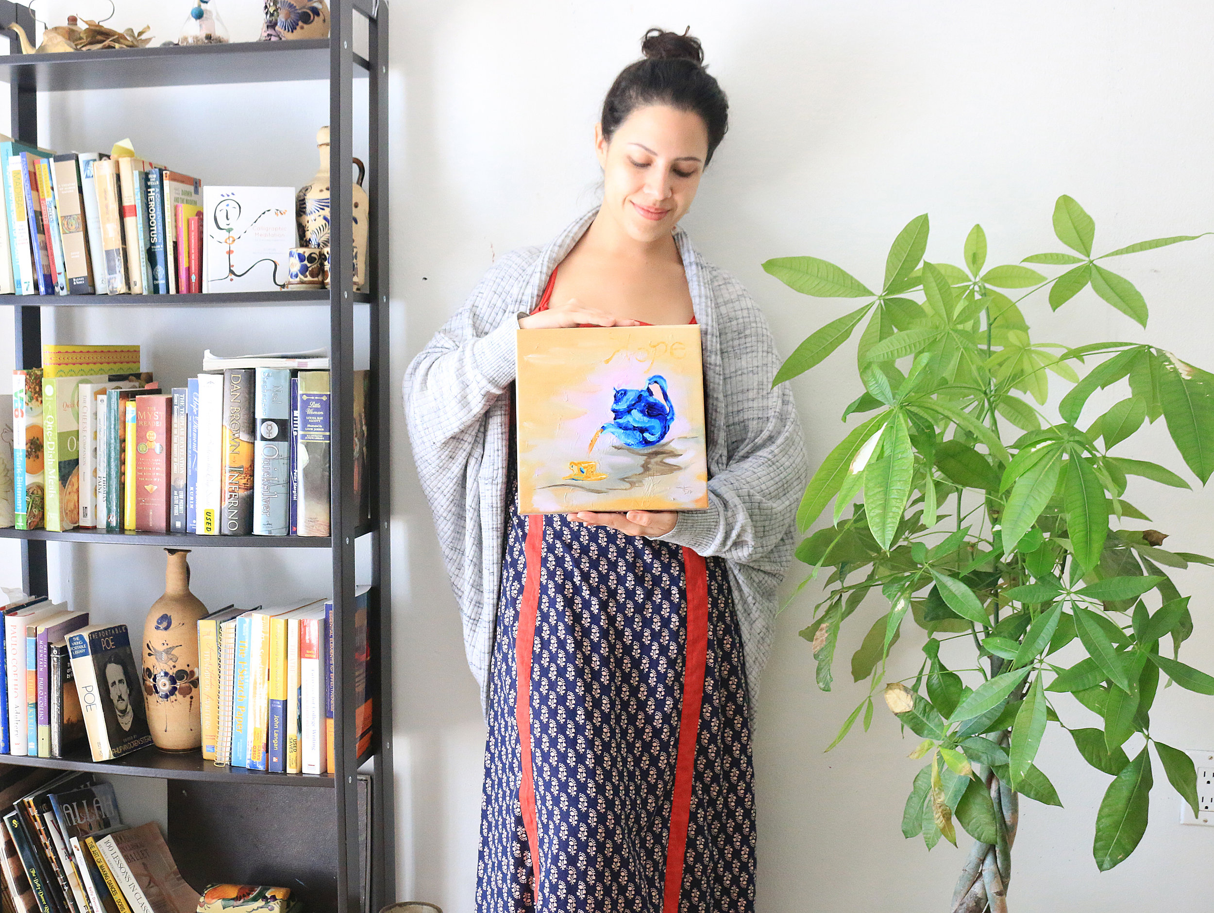 artist with tea pot painting