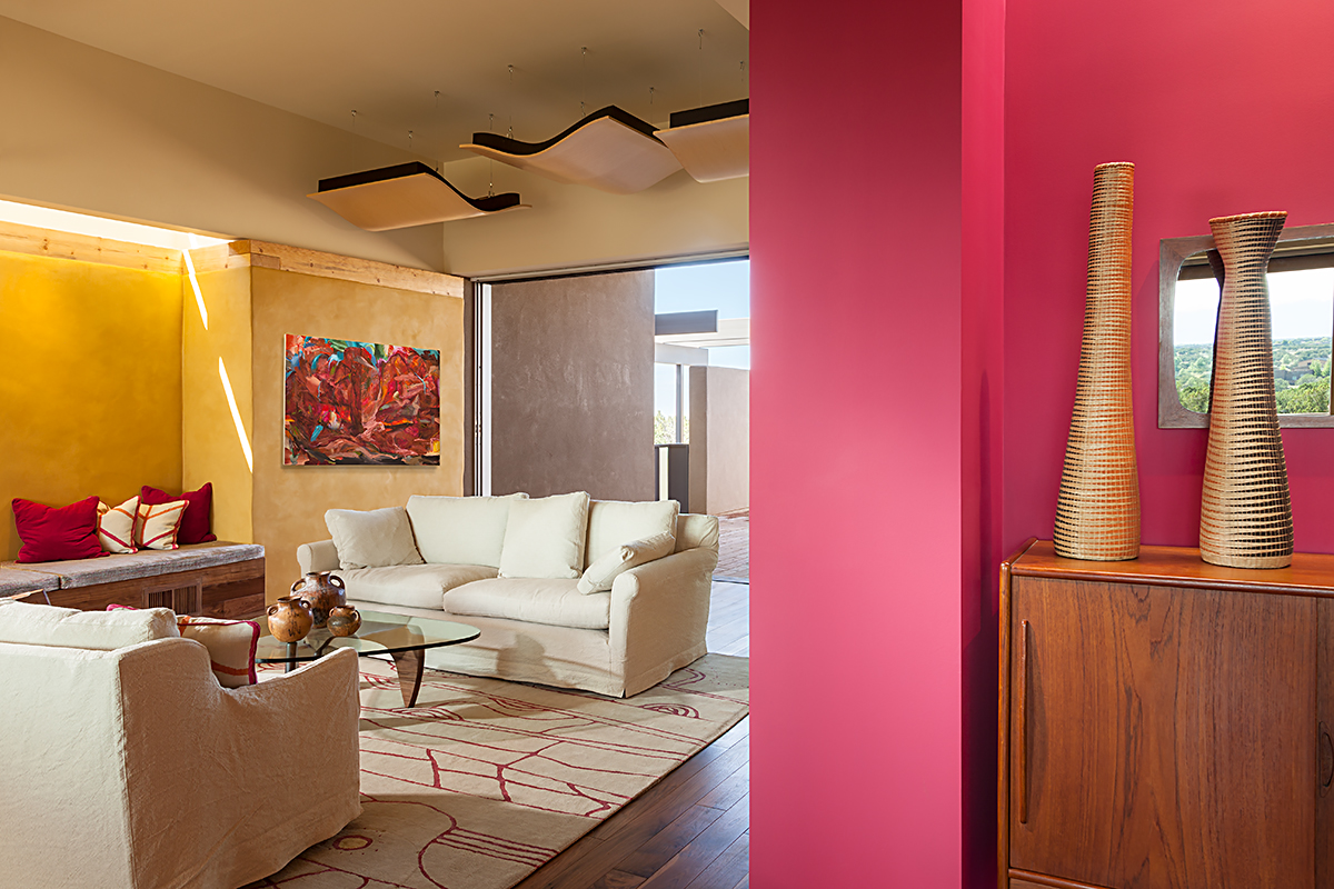 Mud-plastered adobe interior walls soak up the temperature during the day and give it back when this desert home cools at night. This was just one of the many features that earned these homeowners a LEED Platinum certification for green building.