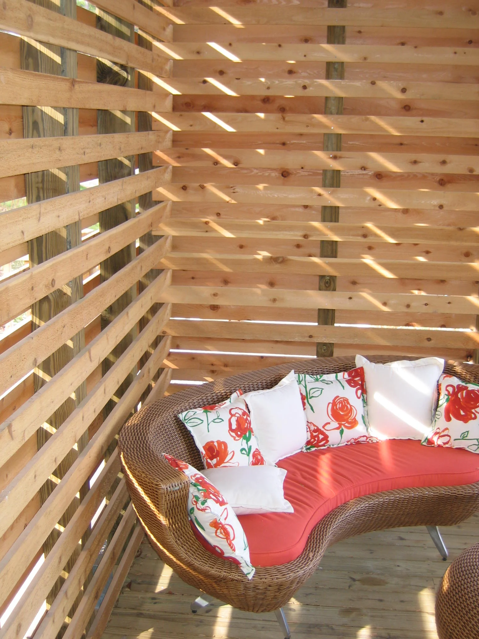  This screen allows the breeze to flow while the view of the driveway is minimized. 