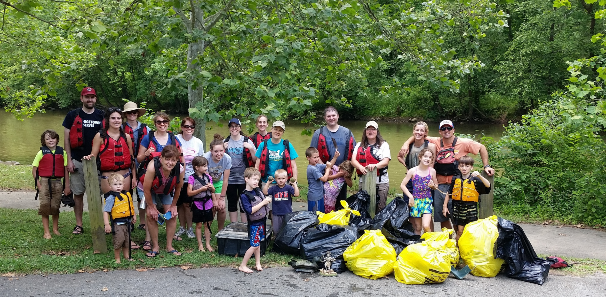 Some of the Earth Stewardship East crew and their haul from June 25 trash cleanup of the Potomac.