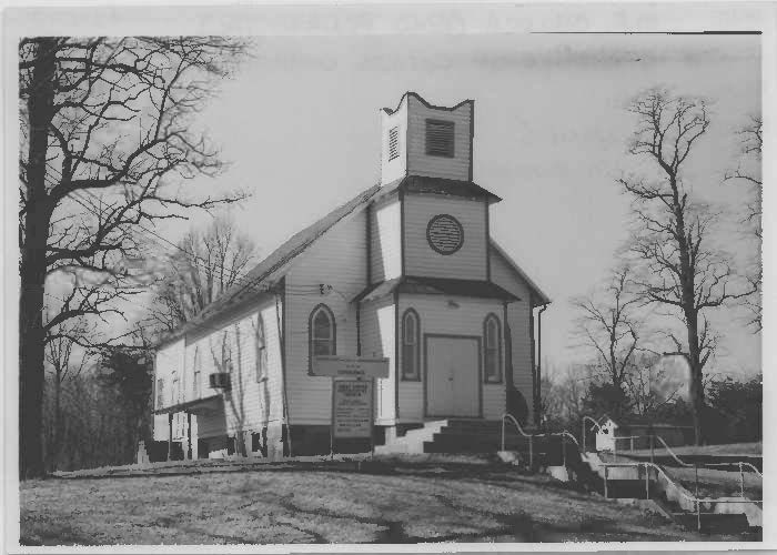Old photo of the Pleasant View Church. Unfortunately all of these mature trees are now gone and the front steps are overgrown. As I talk to people in the community, many think the church is no longer in use. They're wrong. A small (~9) group of friendly folks meets there each Sunday - Mt. Olive Christian Church. Helen Woods is their Pastor. Stop by one of their services on Sunday morning. Sunday School at 10 am; Worship Service at 11:30 am.