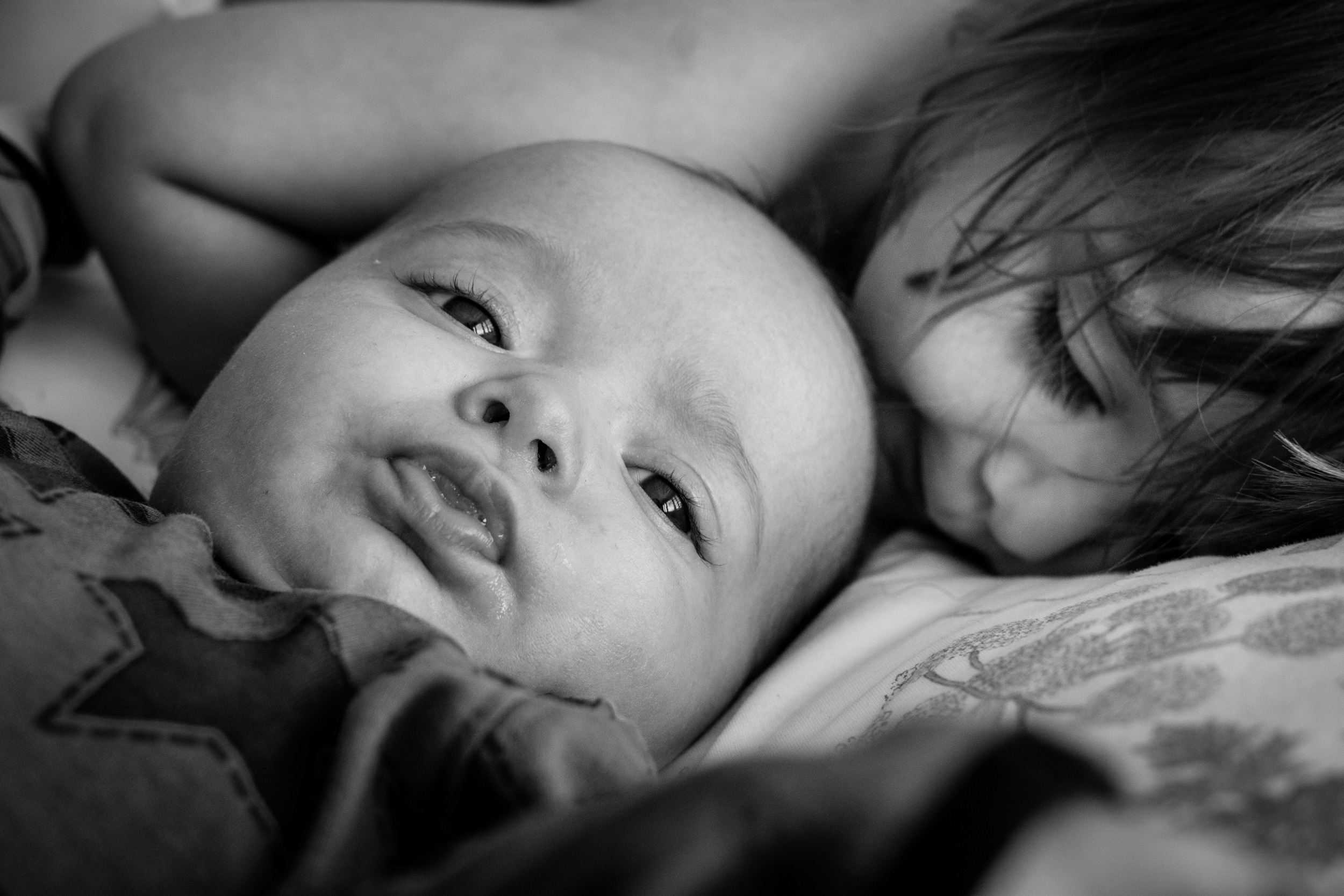 Sharing a cosy moment with little sister