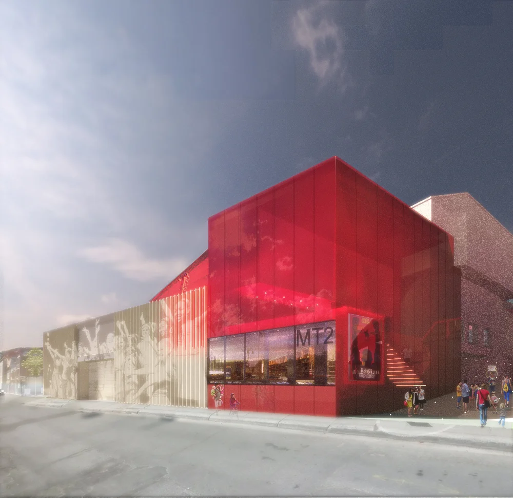Le nouveau volume en verre rouge translucide signale l'entrée du projet