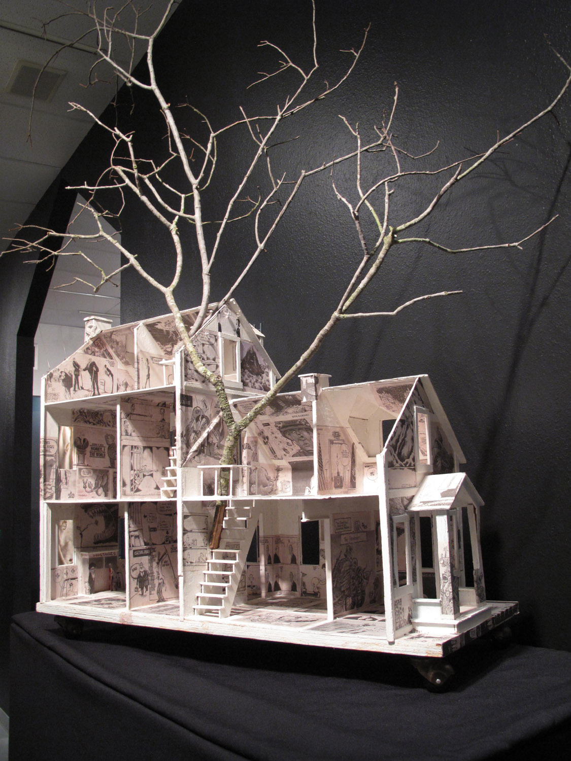 2am(0)-White House, gesso, newspaper collage on wood, tree branch, 35x65.5 x 15 in. 2006.jpg