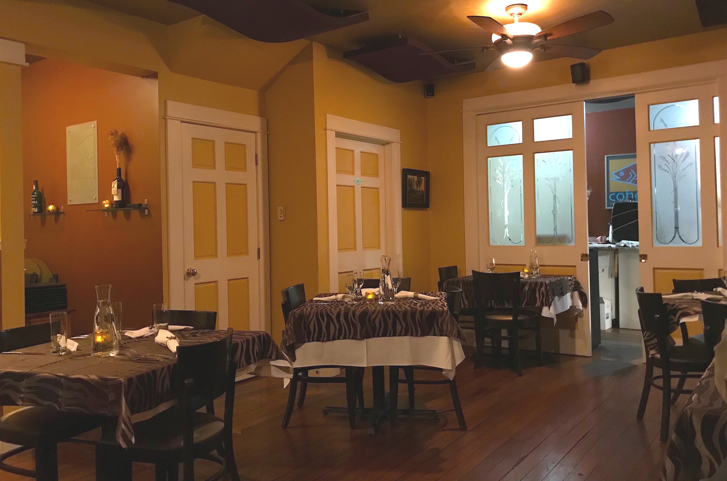 COHO Restaurant’s romantic dining room and kitchen entrance, where the magic happens