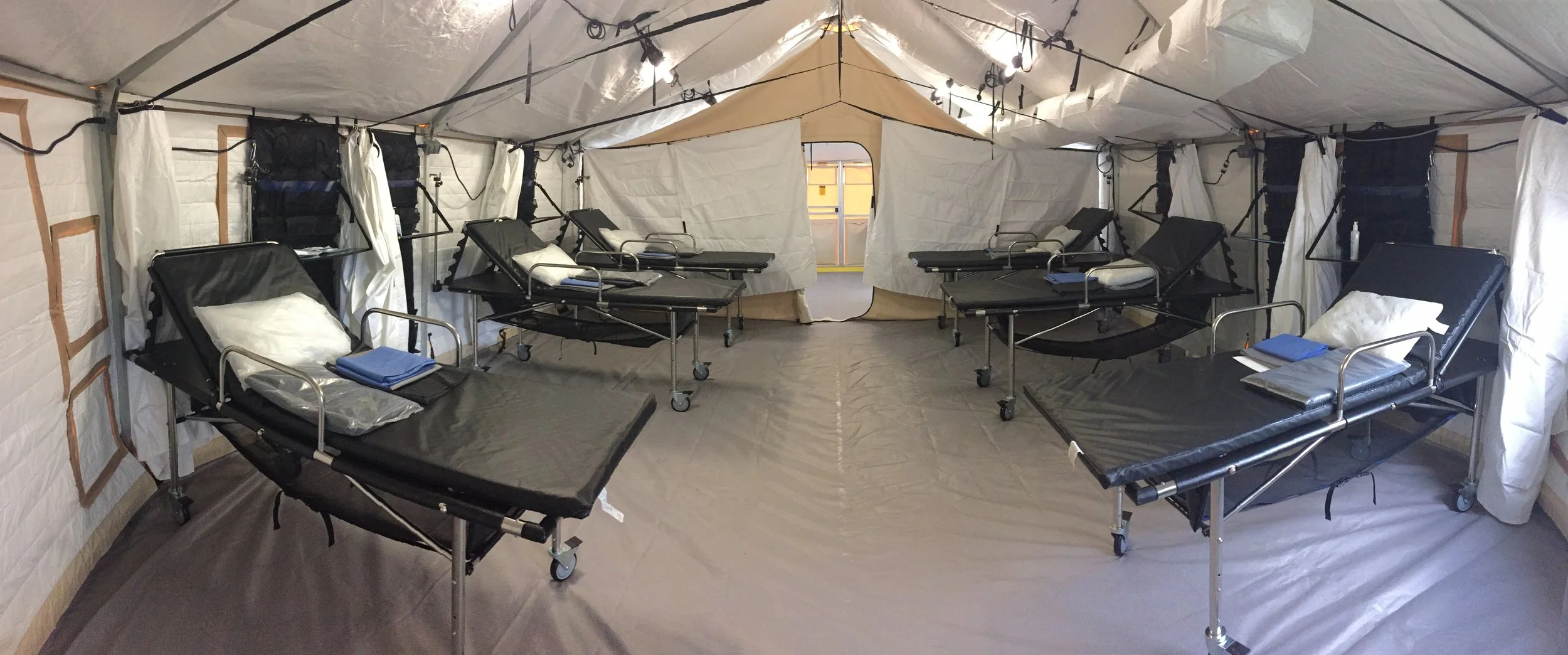 This hospital came fully equipped from Western Shelter. Featured products in this picture include Shelter Insulation, E-Beds, and privacy curtains.