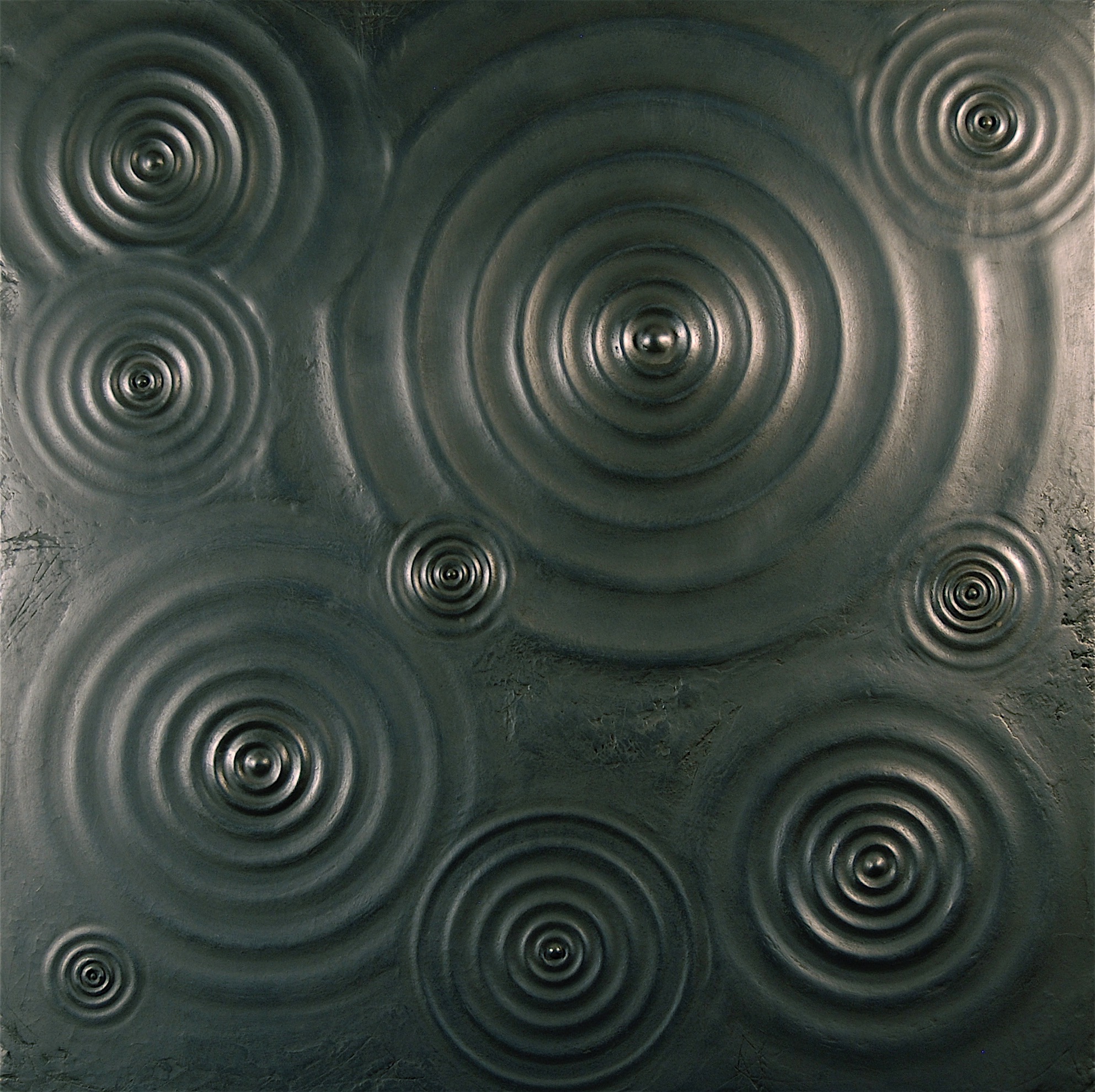Thomas Coffin - Ripple Effect #2 (graphite), 36"h x 36"w x 2"d, mixed media sculptural wall relief