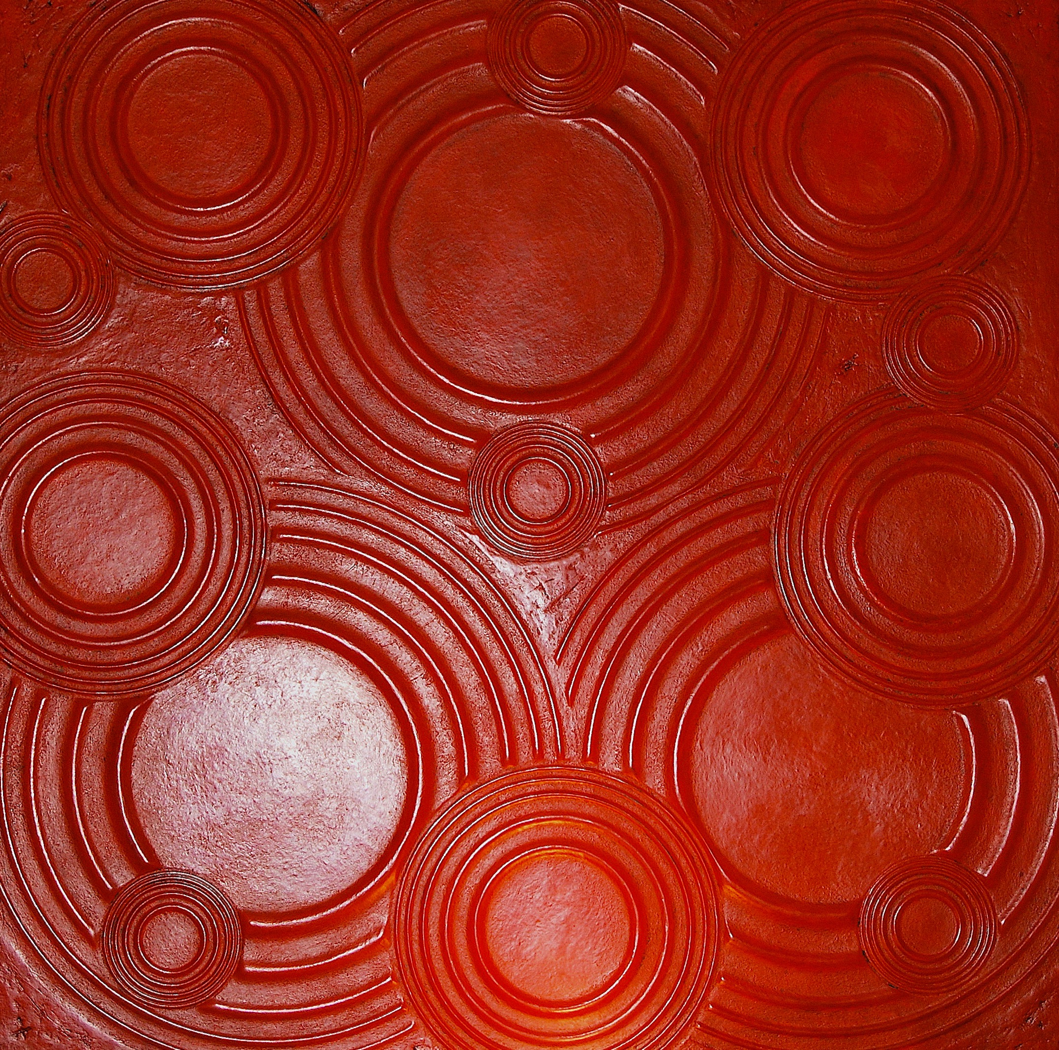 Thomas Coffin - Ripple Effect (red), 36"h x 36"w x 2"d, mixed media sculptural wall relief