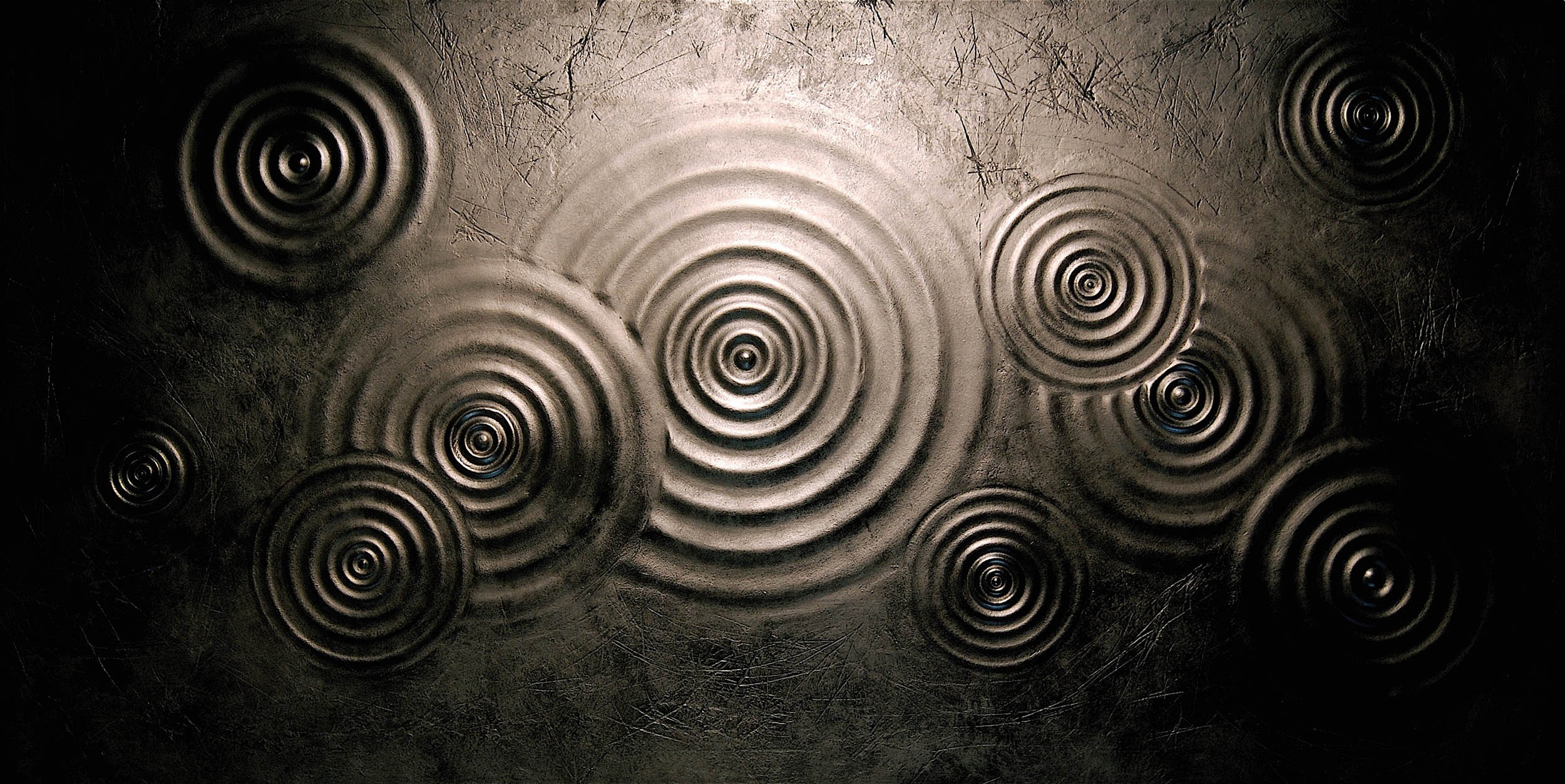 Thomas Coffin - Ripple Effect #5 (graphite), 36"h x 72"w x 2"d, mixed media sculptural wall relief