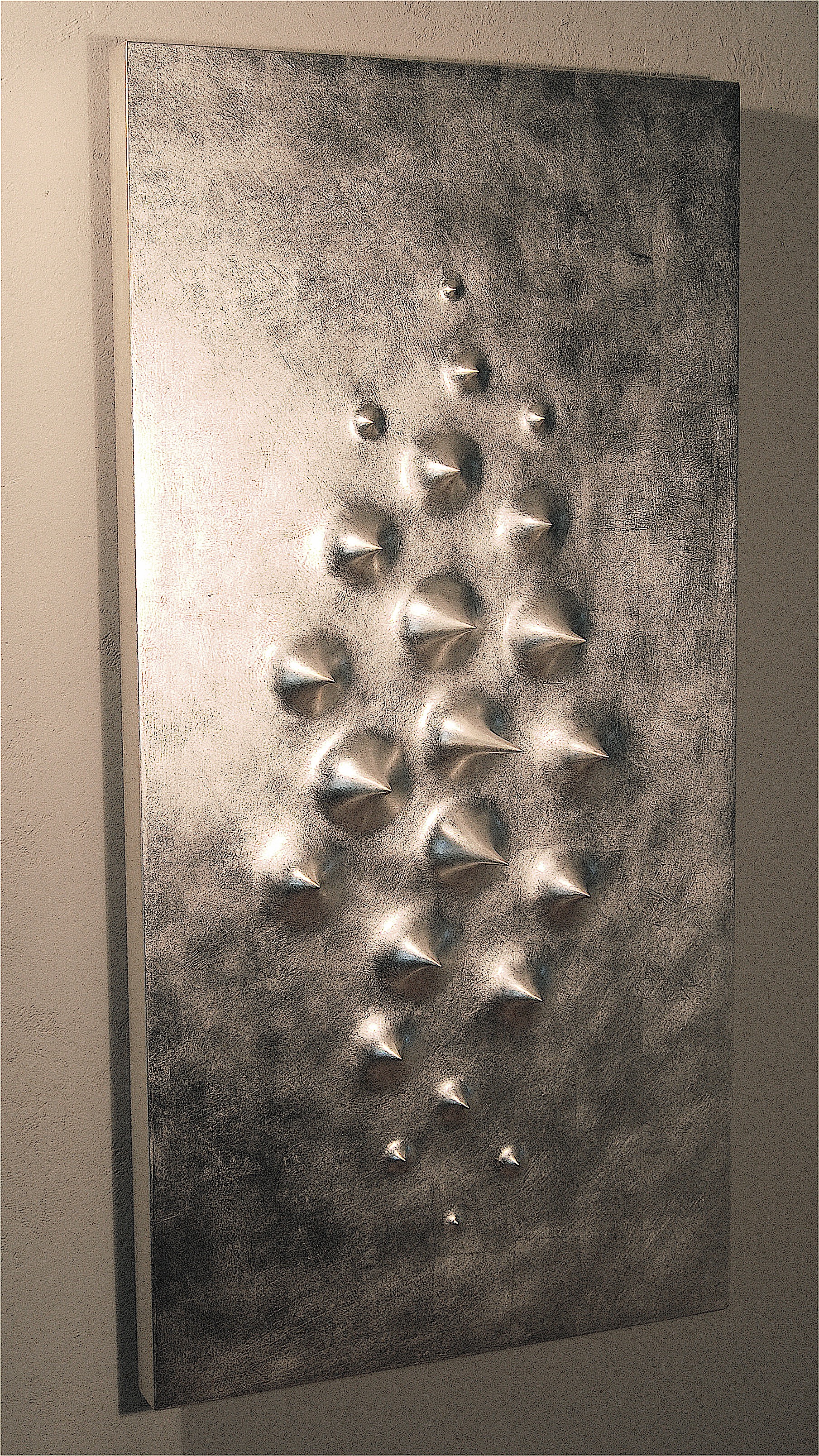 Thomas Coffin - Spikes (14 kt. white gold leaf), 48"h x 24"w x 2"d, mixed media sculptural wall relief